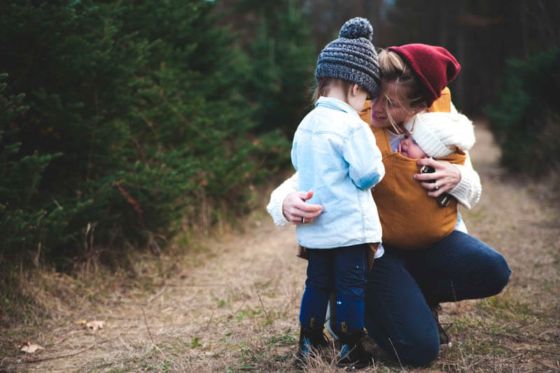 mom hugs child